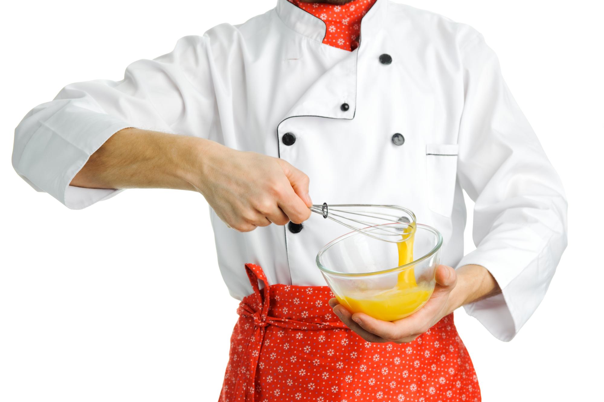Chef hands arranging garnish